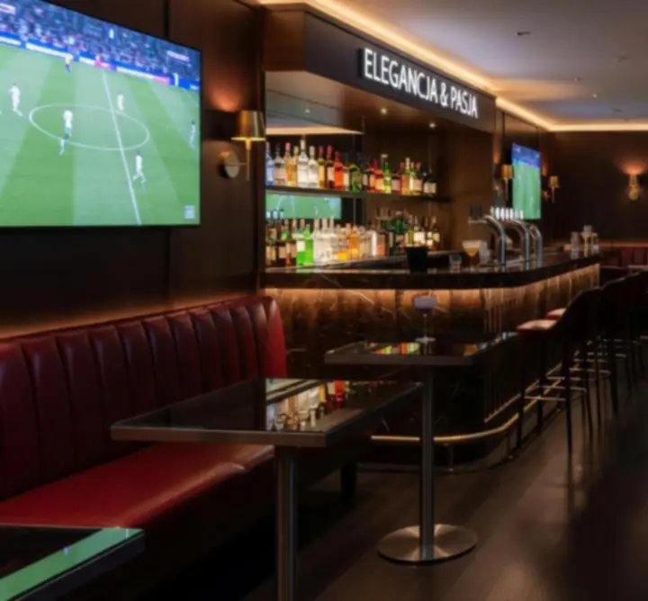 Wyjątkowy wystrój wnętrza baru GOL-INSTAL z eleganckimi i sportowymi akcentami